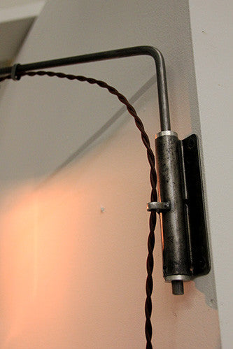 Swing wall light