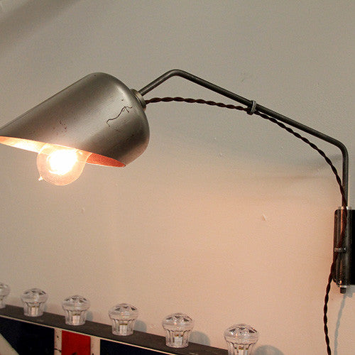 Swing wall light